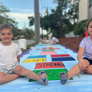 The Child Protection Center Illustrates it Mission with Sidewalk Art