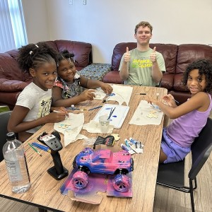 Fab Lab and Sarasota Police Bring Racing Thrills to Housing Authority Kids